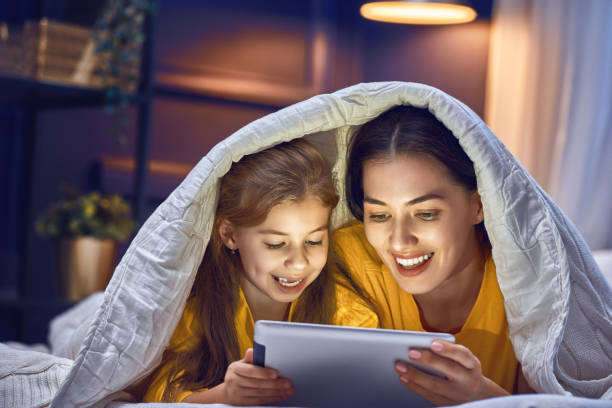 istock mom and child with tablet 891968622