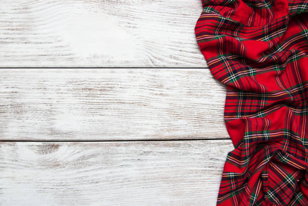 istock Checkered napkin on a wooden background 891968752