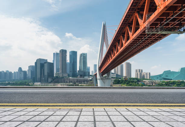 istock modern city skyline and empty urban road 891972058
