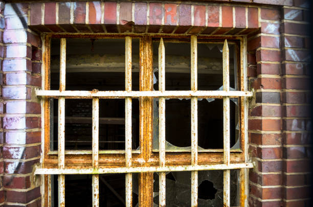 brokwn window of a lost factory in germany