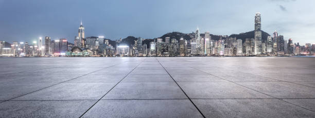 istock Hong Kong empty road and city skyline 891981512