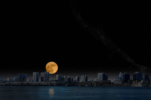 Full moon rising over Tokyo bay area with copy space.
