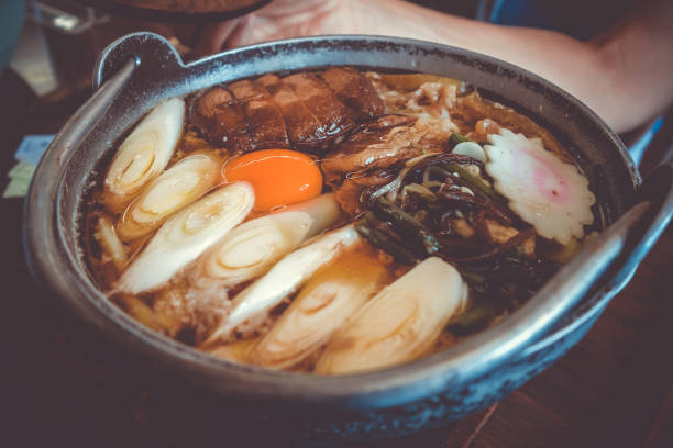 istock traditional japanese sukiyaki meal 892003232