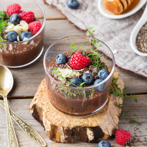 istock Healthy vegan chocolate chia pudding with berries and green thyme 892006160