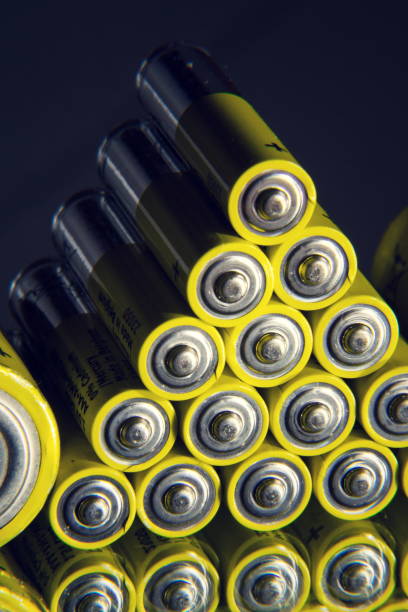 istock Yellow double A batteries reflecting in mirror, electricity storage concept 892018298