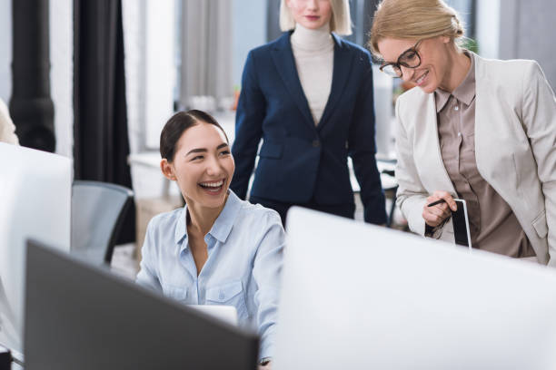 istock multicultural businesswomen at workplace in office 892019316