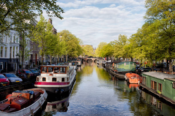 istock Boats on Amsterdam Canal 892022518