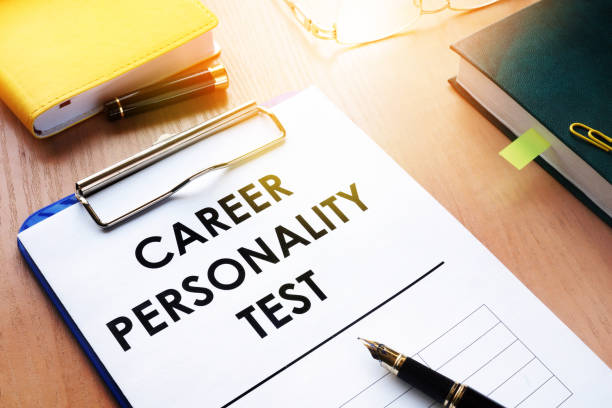 Clipboard with Career personality test on an office desk. Clipboard with Career personality test on an office desk. Assessments concept. personality test stock pictures, royalty-free photos & images