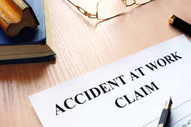 istock Accident at work claim and glasses on a table. 892028610