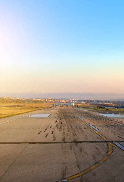 istock Planes on airport runway in the morning. 892028926