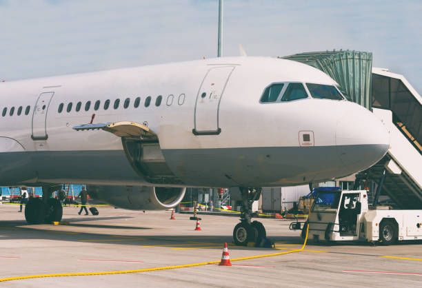 istock Passenger plane in the airport. Unboarding. 892029196