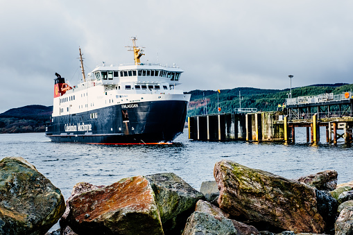 The Caledonian MacBrayne vessel MV Finlaggan at Kennacraig harbour in the west coast of Scotland. The ferry takes passengers, cars and lorries on the voyage between Kennacraig on the mainland, Port Askaig and Port Ellen on Islay, the island of Colonsay, and the town of Oban.