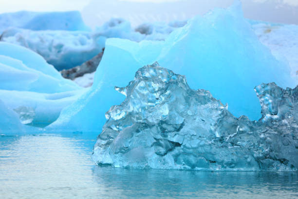 istock Little blue iceberg floating on the sea 892035988