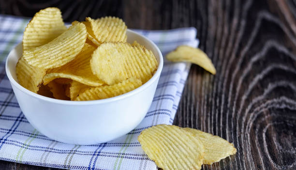 istock Salty snacks for beer on wooden 892038966