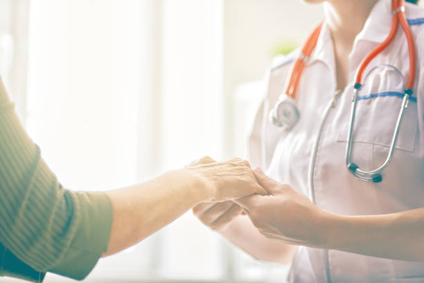 Female patient listening to doctor Female patient listening to doctor in medical office. oncology stock pictures, royalty-free photos & images