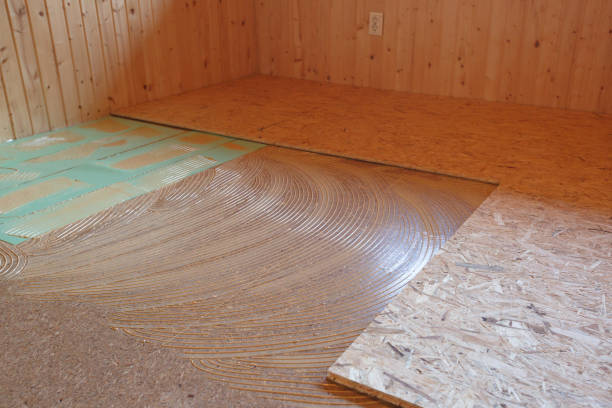 istock Laying of new parquet flooring in progress 892047030
