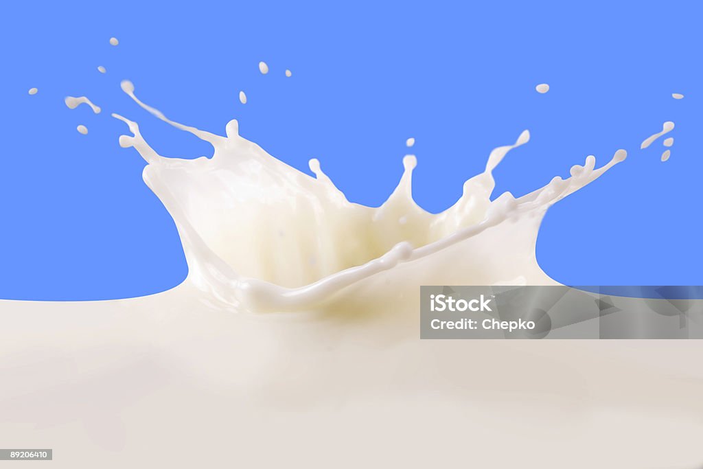 Latte splash - Foto stock royalty-free di Bianco