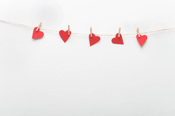 istock Red hearts hanging on clothesline - Valentine's day 892070266