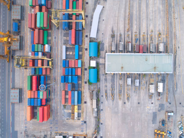 istock container,container ship in import export and business logistic,By crane,Trade Port , Shipping,cargo to harbor.Aerial view,Water transport,International,Shell Marine,transportation,logistic,trade,port 892077128