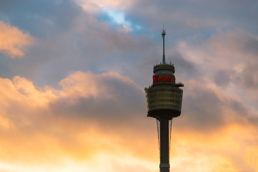 Sydney, Australia - November 2, 2017: Sydney tower with glowing sunset sky on the background