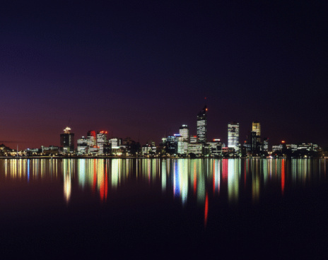 The city skyline of Melbourne, Victoria, Australia and the River Yarra at dusk.