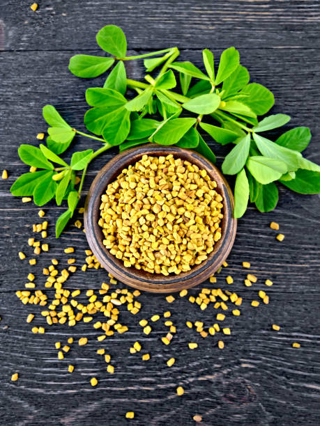 istock Fenugreek with leaf in bowl on black board top 892089062