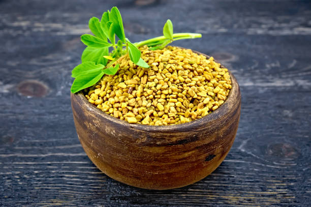 istock Fenugreek with leaf in clay bowl on board 892089084