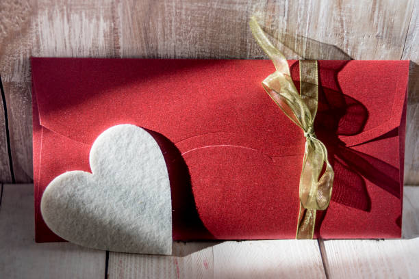 istock White heart and red letter 892089392