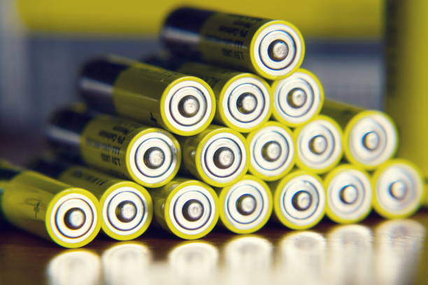 istock Yellow double A batteries reflecting in mirror, electricity storage concept 892092292