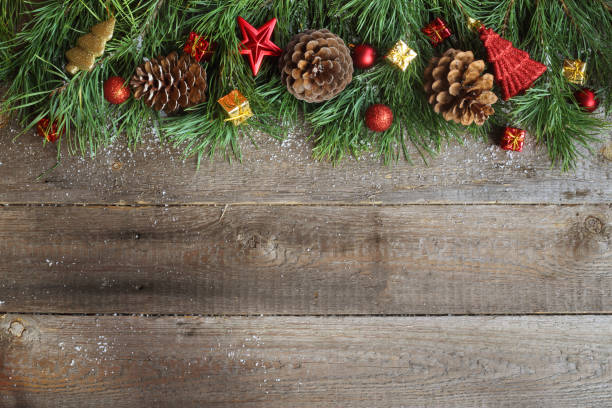 istock Christmas card on wooden background 892095422