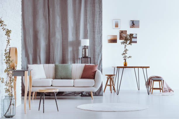 istock Grey curtain in bright apartment 892096026