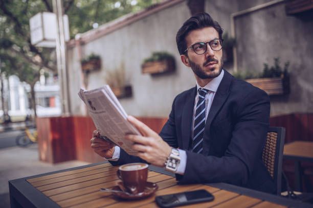 istock Businessman in cafe 892096988
