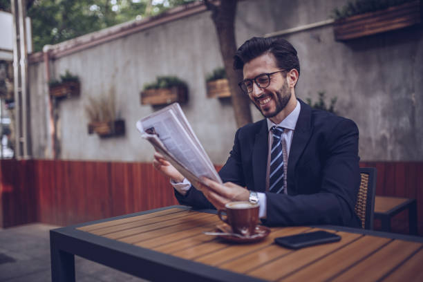 istock Businessman reading the news 892102442