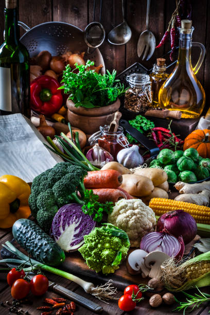 istock Colorful fresh organic vegetables shot on rustic kitchen 892109618