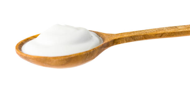 istock Yogurt on Wooden Spoon 892125580