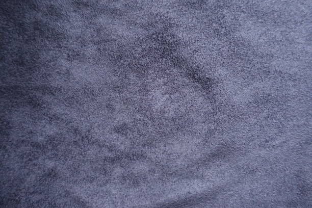 Indigo artificial suede fabric surface from above Indigo artificial suede fabric surface from above unprinted stock pictures, royalty-free photos & images