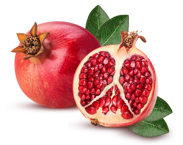 istock Ripe pomegranate fruit and one cut in half with leaf 892142310