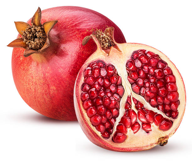 istock Ripe pomegranate fruit and one cut in half 892142638