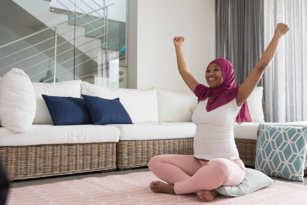 istock Pregnant woman practicing yoga 892147872