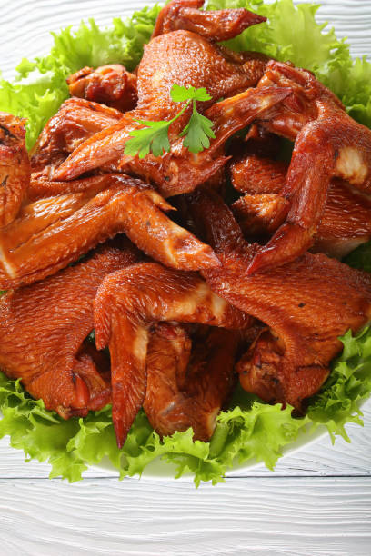 istock close-up of crispy smoked chicken wings 892150528