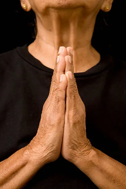 Photo of Old woman praying