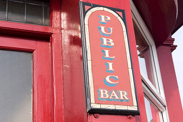 istock Rustic Red Public Bar Sign hanging on Red Building 89215722
