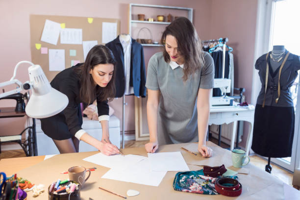 istock Fashion Designers Working In Their Art Studio 892160104