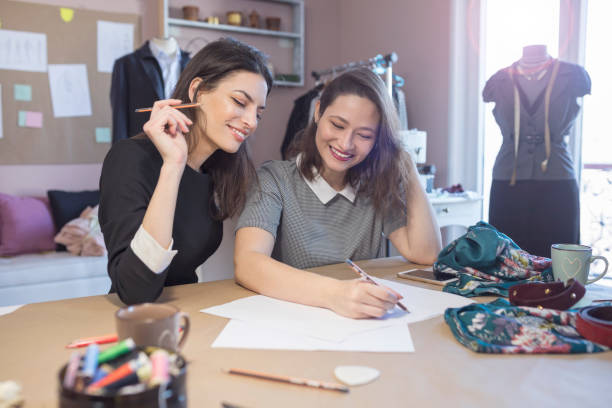 istock Fashion Designers Working In Their Art Studio 892160108