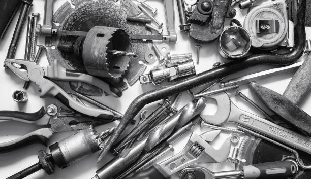 istock Working metal tools of silver color on the background 892160296