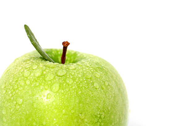istock Beautiful green apple isolated on white 89216192