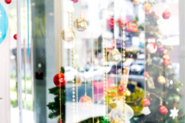 istock Blurred big bright Christmas tree decorated. Bokeh background 892166006