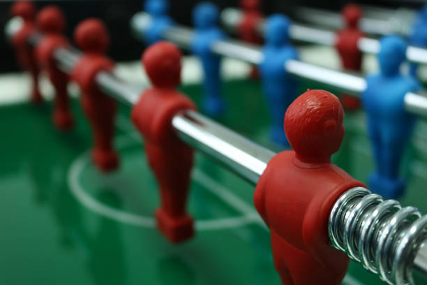 istock Table football game with red and blue players team 892171018