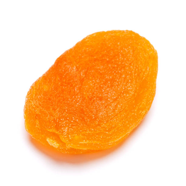 istock Dried apricot close-up isolated on a white background. clipping path 892180864
