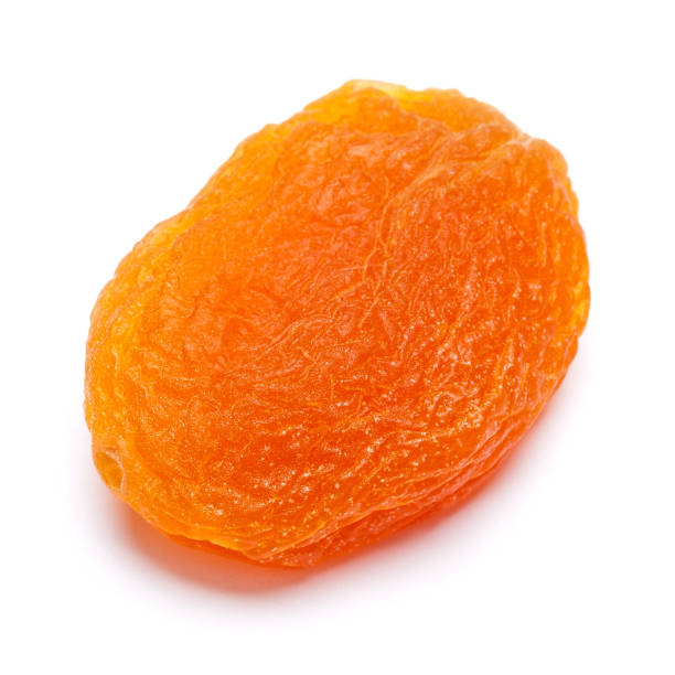 istock Dried apricot close-up isolated on a white background. clipping path 892183004